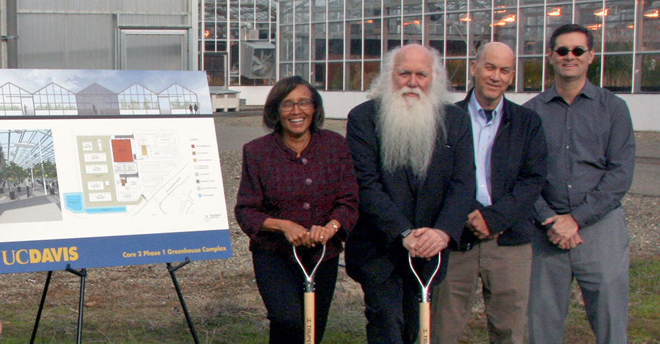 From left: Helene Dillard, dean of the UC Davis College of Agricultural and Environmental Sciences; Howard Shapiro, chief agricultural officer at Mars, Inc.; distinguished UC Davis professor and plant geneticist David Mackill and Jim Carrol, Associate Vice Chancellor for Design & Construction Management look forward to construction of new greenhouses where researchers can cacao under any number of climatic conditions.