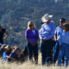 Ranchers in field