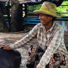 Cambodian farmer with pig